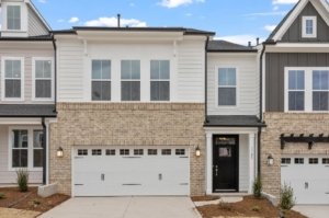 two car garage exterior of a two story townhome